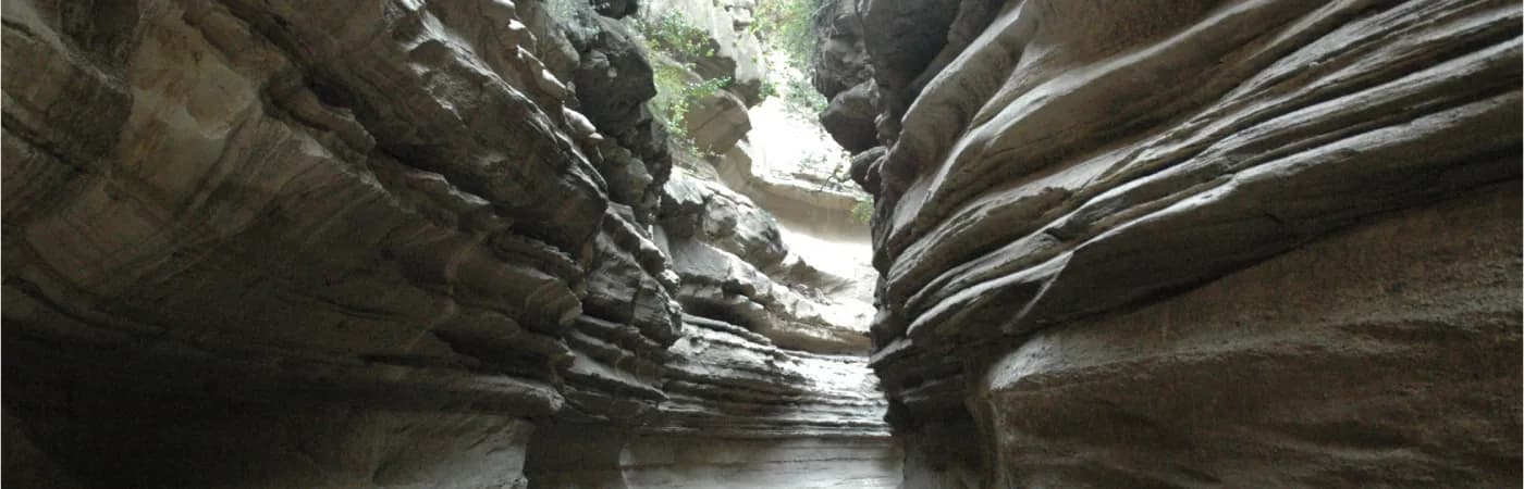 Narrow volcanic gorge carved by water in Hell's Gate National Park